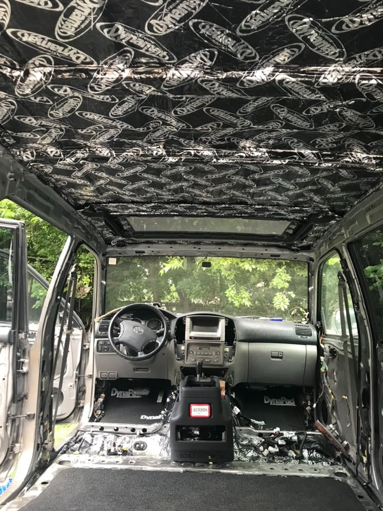 Full Dynamat sound-deadening installation across cabin floor