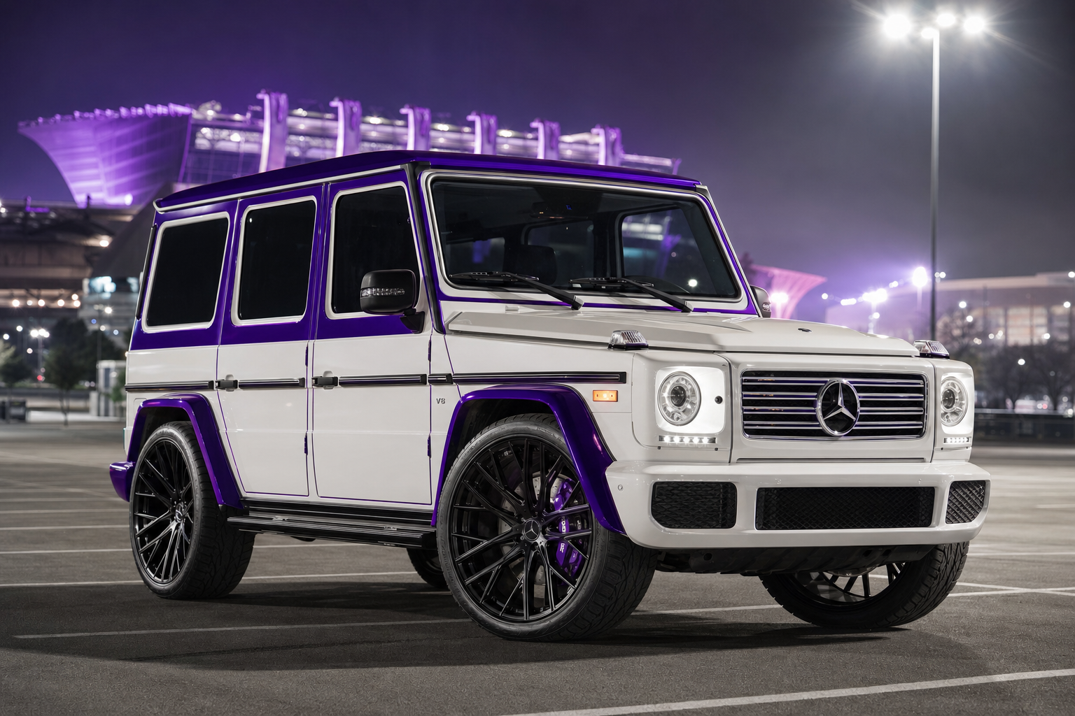 2005 Mercedes G500 — Tony's Truck — Pearl White with Horned Frog purple roofline and fender flare accents, black forged wheels with purple brake calipers, parked at stadium night.